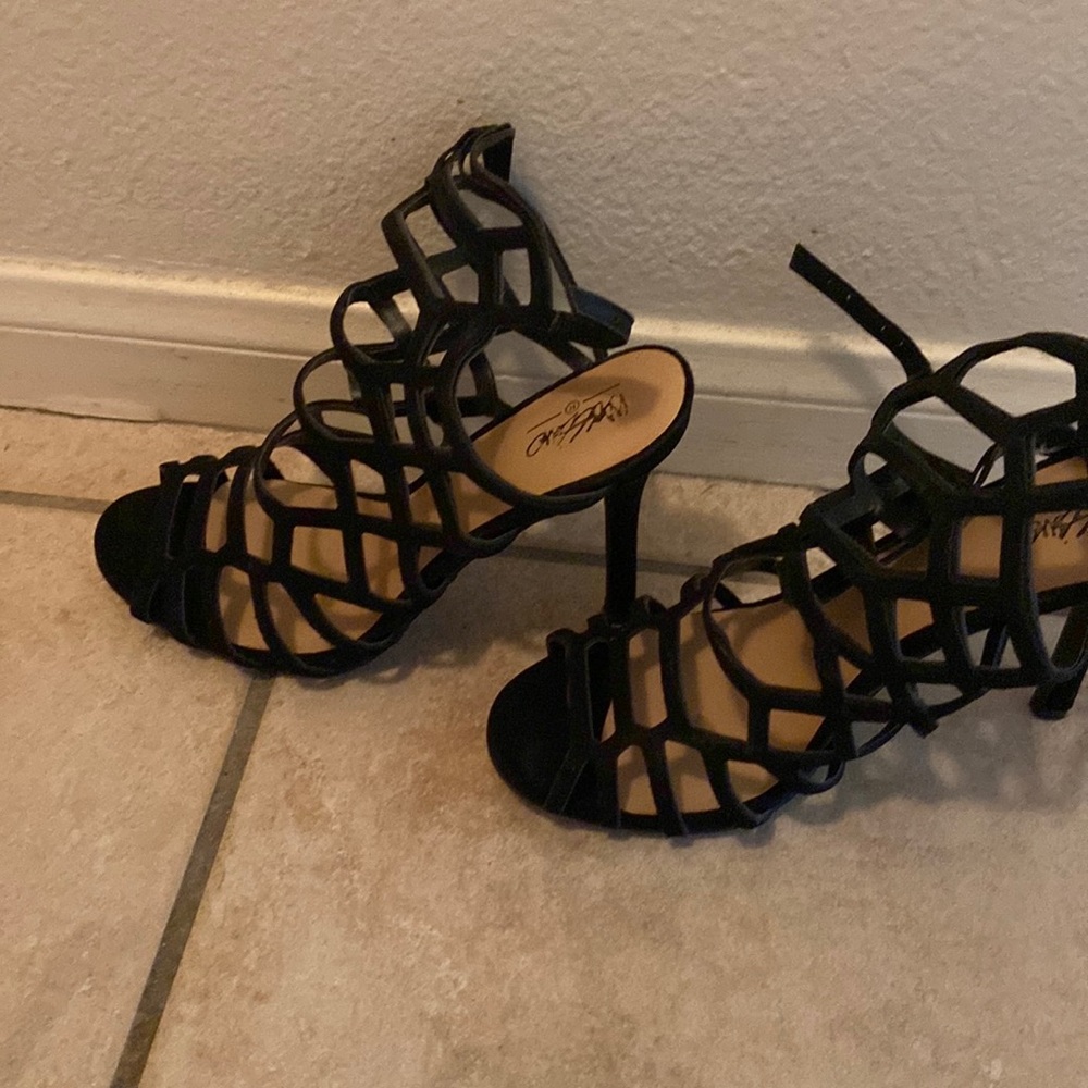 Black sexy strap up high heels can’t wear heels no more